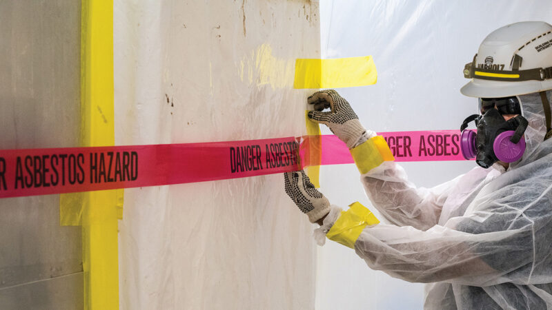Nabholz worker performing asbestos abatement